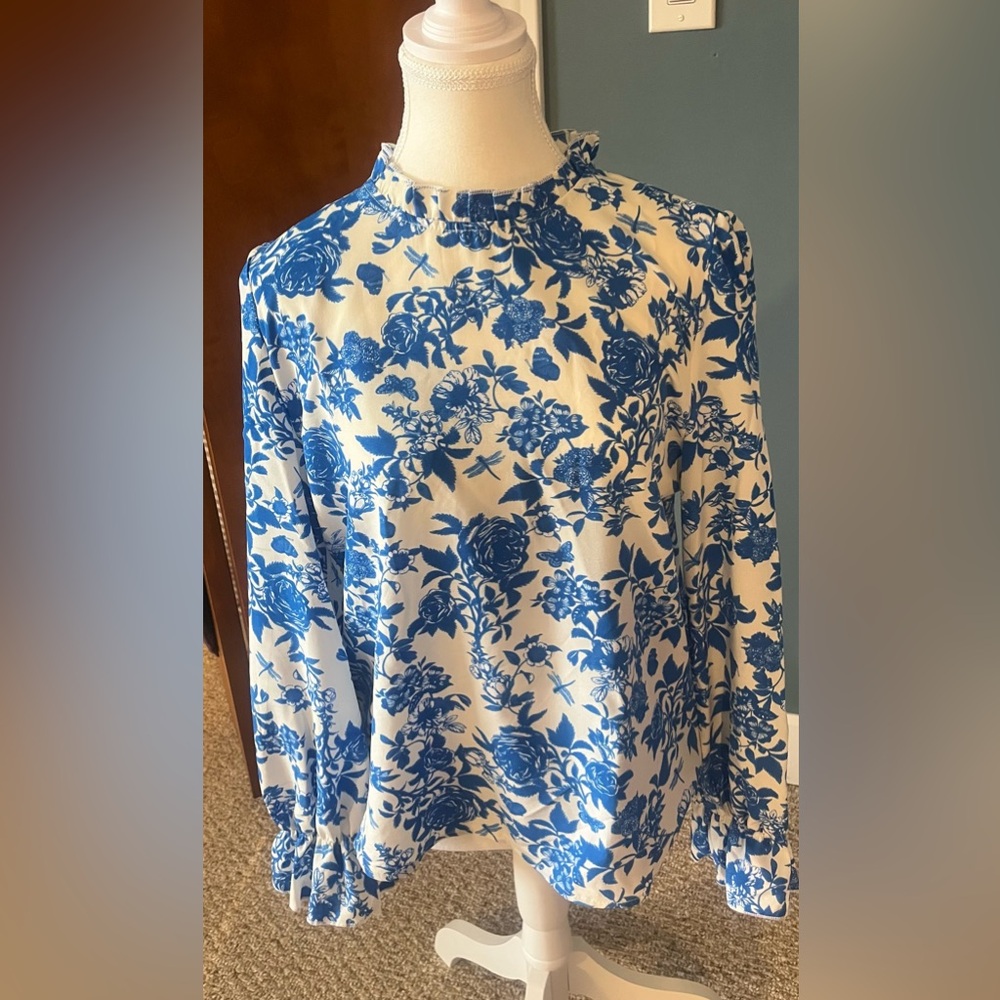 Adorable SHEIN long sleeved blouse. Never worn.